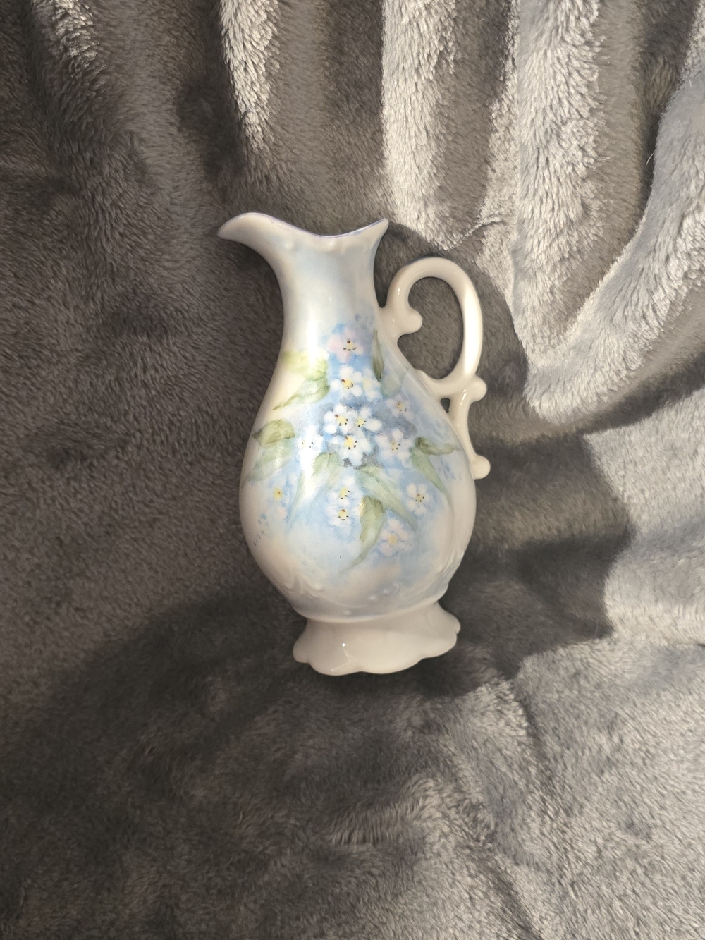 Hand-Painted Porcelain Pitcher with Blue Floral Design